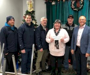 Pictured L-R: Chris Arsenault, Remi Valdron, Ken Matthews, Evelyn McNulty (Romero House), Dickie McGuire and Rick Benoit